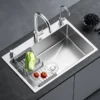 vegetable washing sink in the middle of the pool